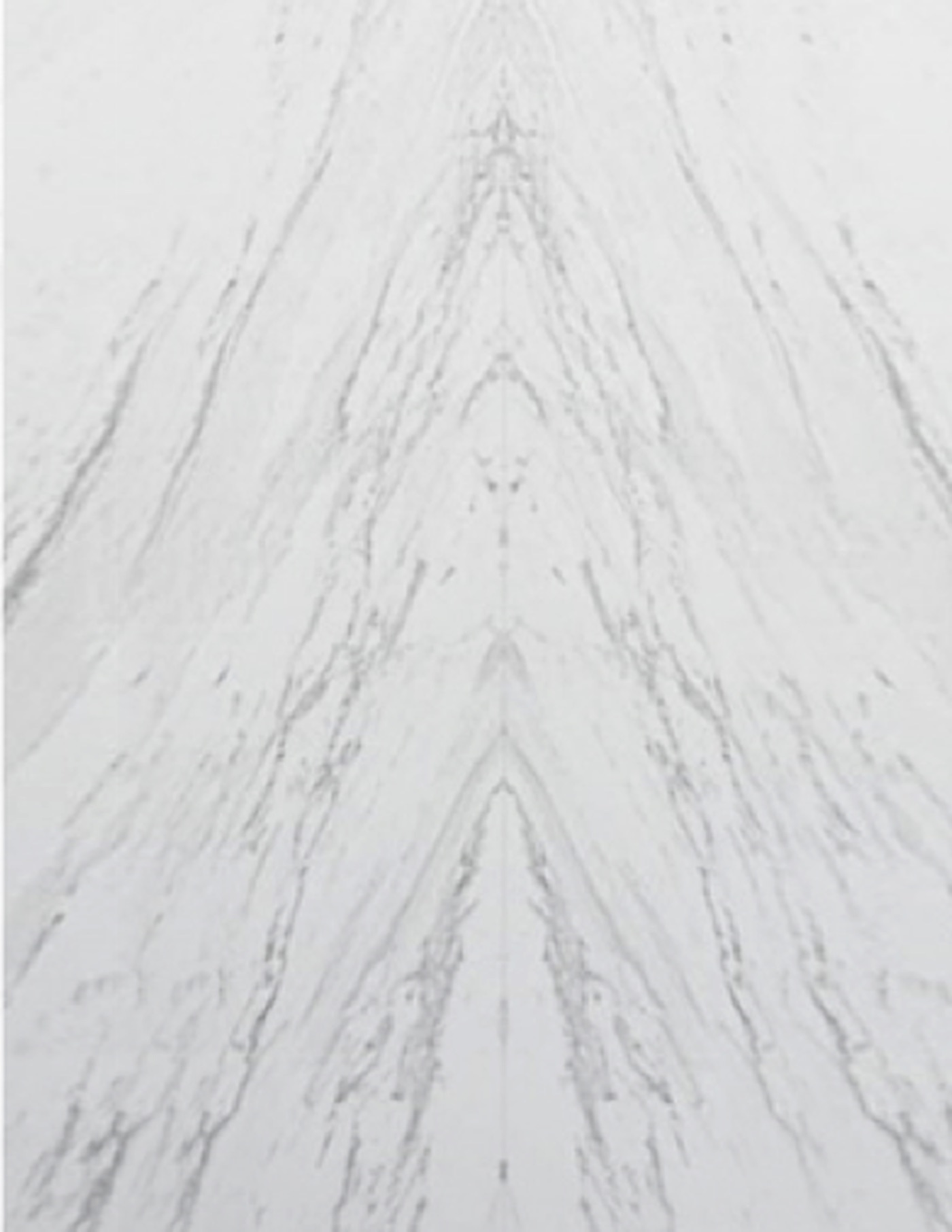 A honed marble slab, its veining caught in raking light