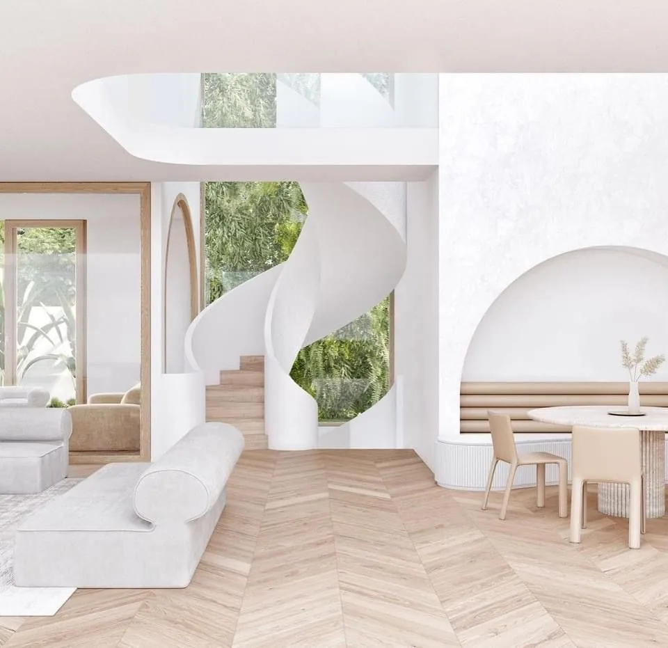 Pale interior with a white spiral stair, herringbone wood floor, curved seating, and a skylight